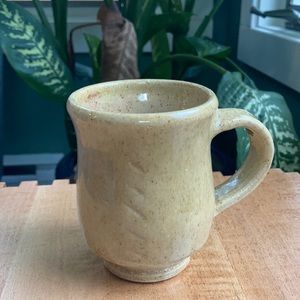 Handmade pottery coffee mug tan yellow brown